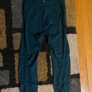 Lululemon, size 8, dark forest green with mesh leg detail